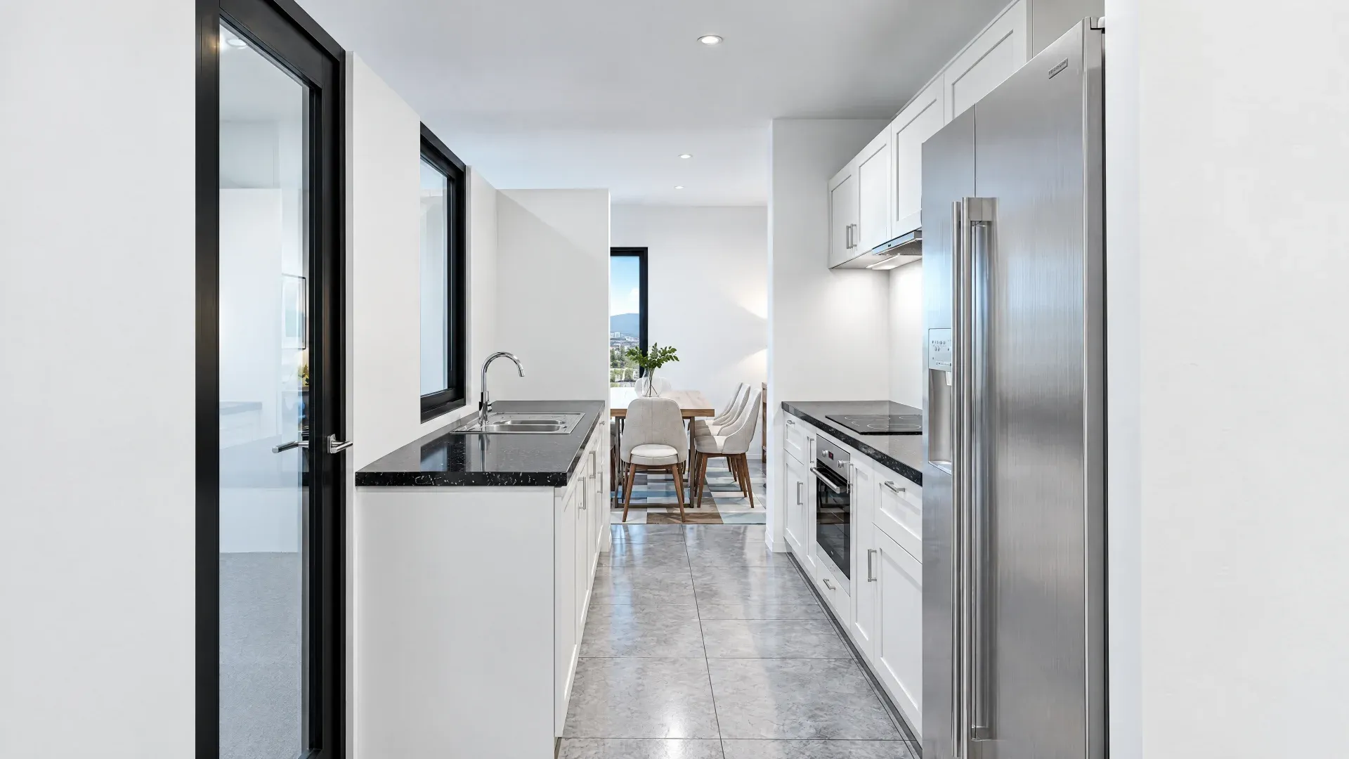 Kitchen and hallway in a Masías at the Hills model home
